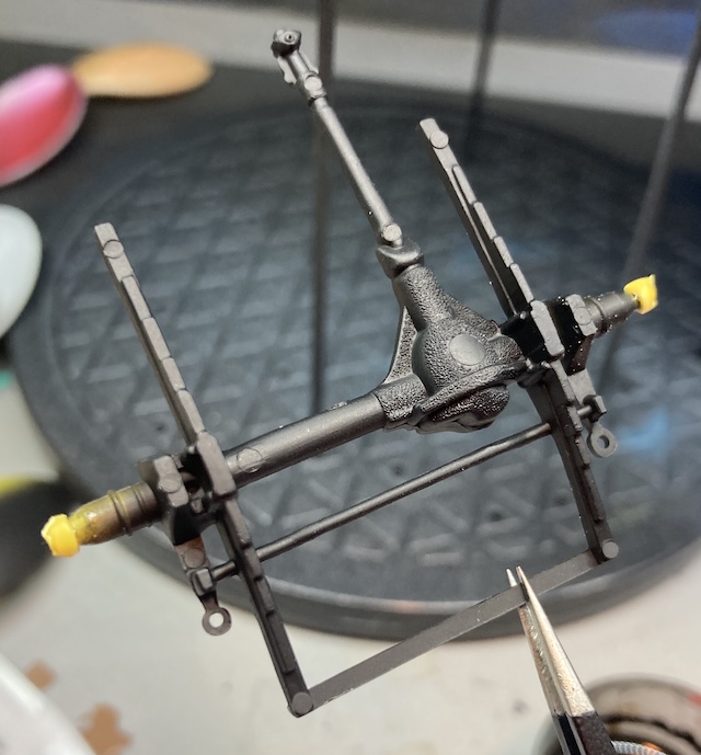 The homemade axle pins are mostly okay, but you can tell one side is longer than the other.