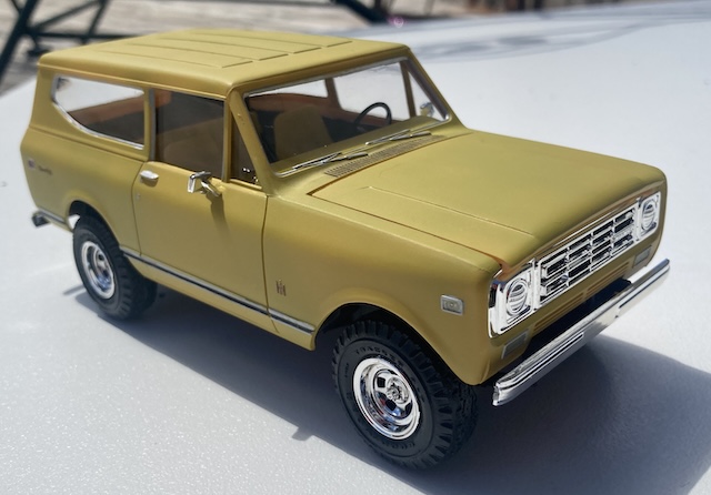 The front passenger quarter of the truck is in the sun.