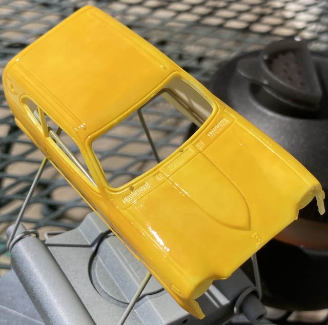 The body has orange speckles and uneven yellow. I also haven't fixed the flashing on the A-pillar.