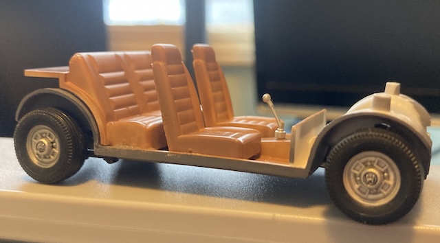 The tires are on the bare chassis now. It looks kind of like a moon buggy.