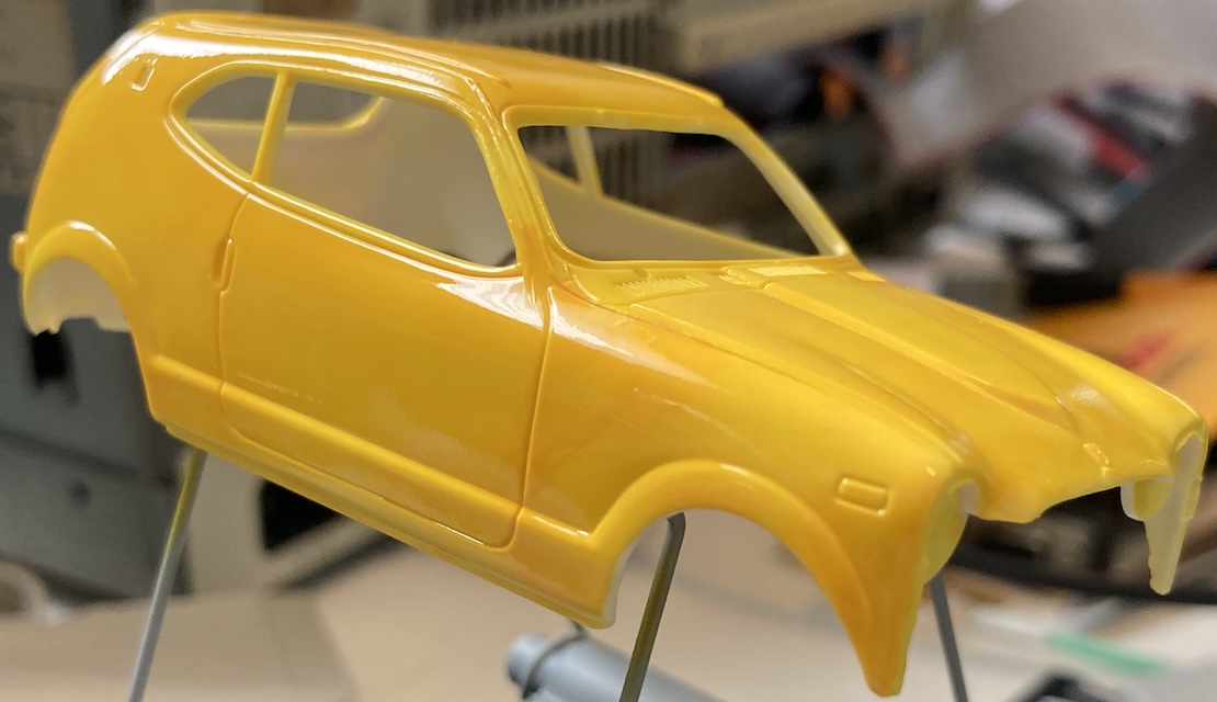 The body has been curing for a few hours, and looks a little better in indoor light, but is still very uneven.