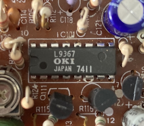 A chip reading OKI L9367, built in Japan, date code 7411.