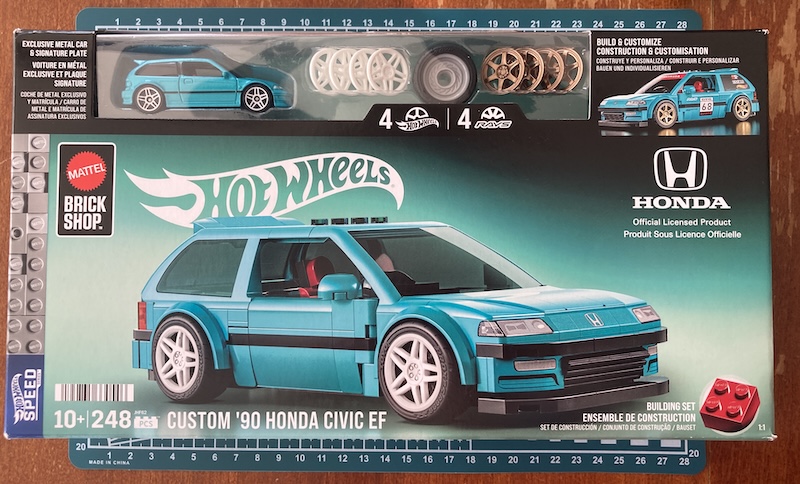 The front of the box, showing off the various customization options for wheels, and also the 1:64 Civic toy.