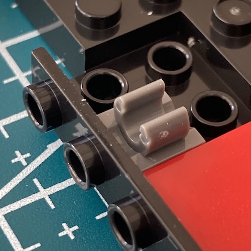 The seat clasp has a lot of flaws and mars in the shot.