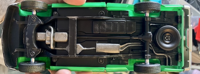 The fake engine is installed into the drybrushed frame.