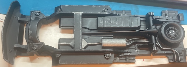 The underbody has a painted muffler, and some dry brushing for accents. It looks like Dean has hit some rocks with this thing.