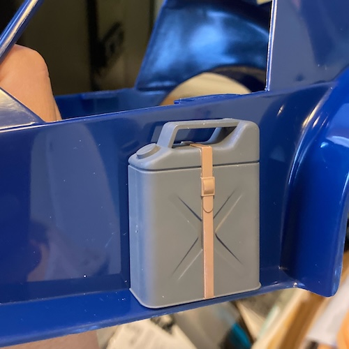 The brown belt on the can looks really nice, but you can tell the dark grey paint is falling off.