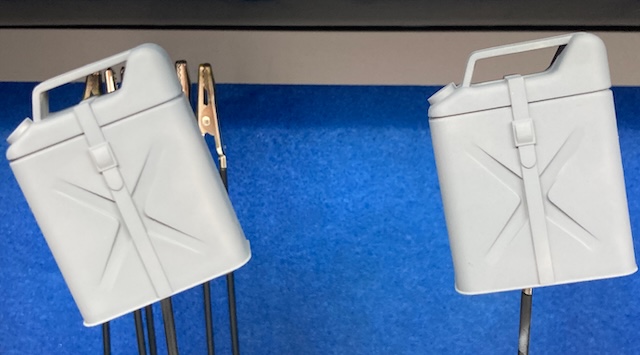 The gas cans are a relatively light grey for a supposedly dark grey