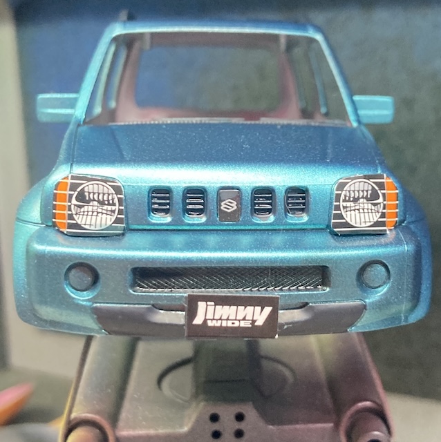 The headlights and badge are finally on it, and it's a nice metallic blue.