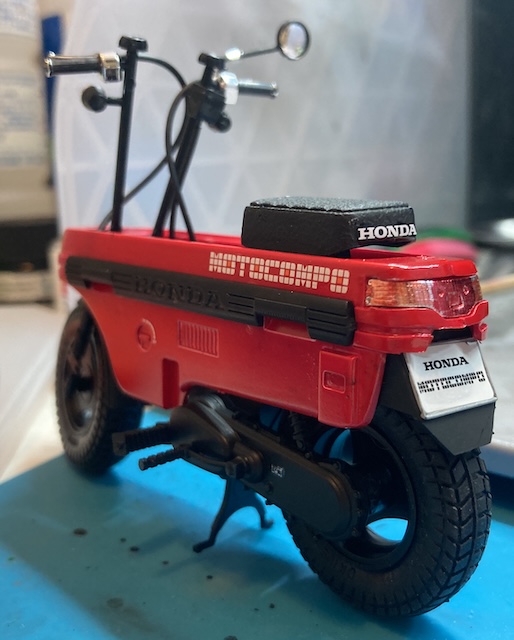 The rear left side of the model.