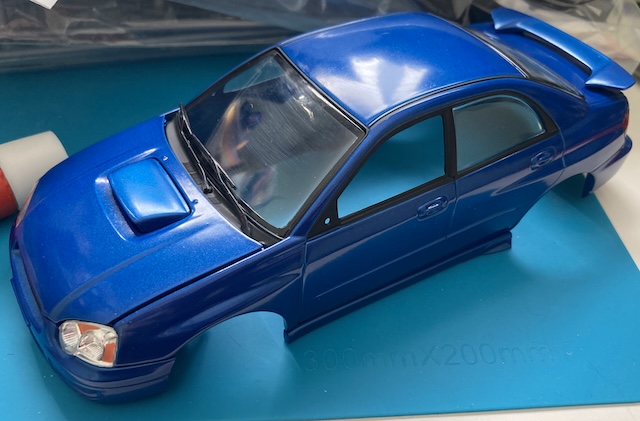 The body has been removed from the box. Even though I've just now removed it, the windshield is dirty.