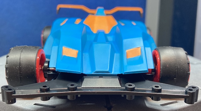 Head-on, you can see that the tires look oddly wide compared to the body.