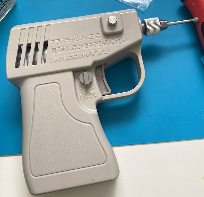 The final assembly: an entire Tamiya Electric Handy Router. The button on the side is for the shaft brake so you can tighten the chuck properly.