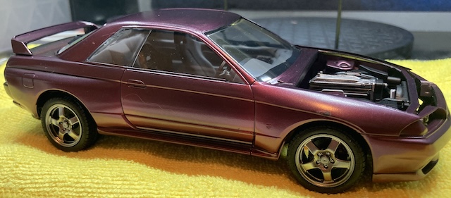 The windshield is visibly crooked in the frame, with lots of dried glue all over it. The frit also looks terrible.